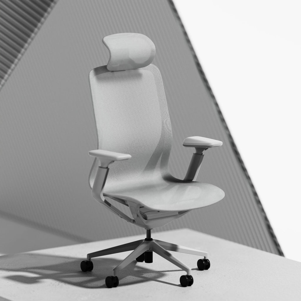 A modern grey ergonomic office chair with a headrest, adjustable armrests, and a five-wheel base, shown on a clean white surface with a geometric background.