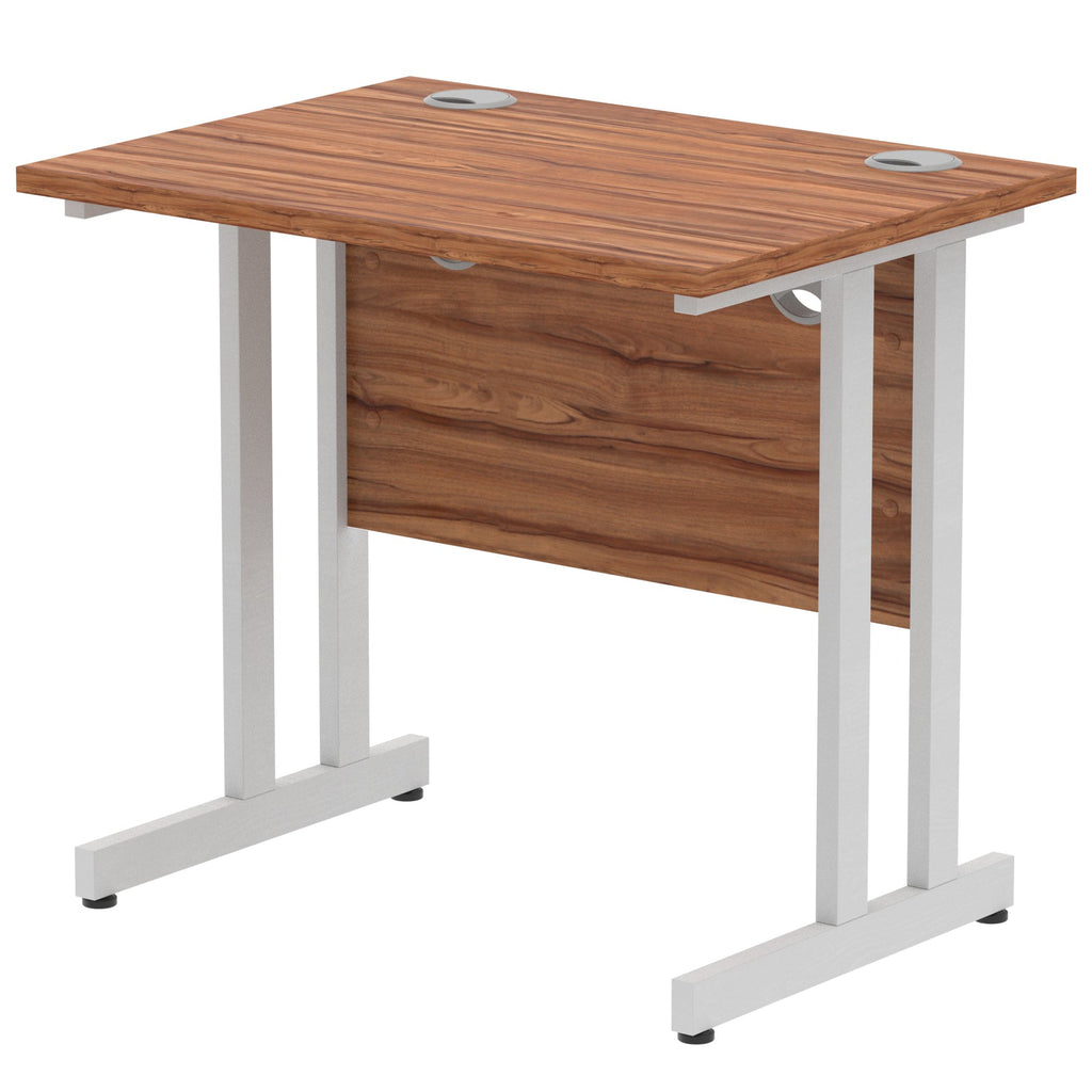 Wood-effect desk with cantilever metal legs on a white background