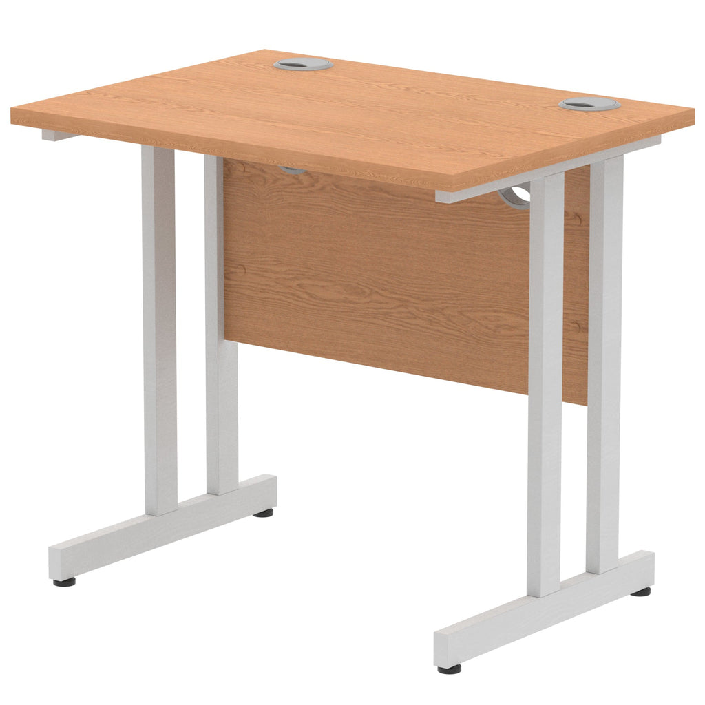 Wood-effect desk with cantilever metal legs on a white background