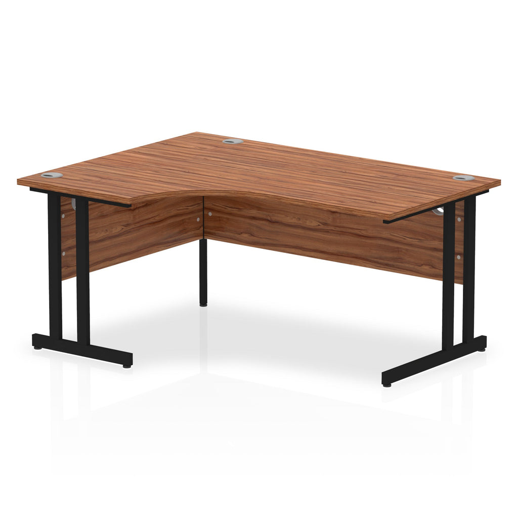  L-shaped desk with wood-effect top and metal legs on a white background