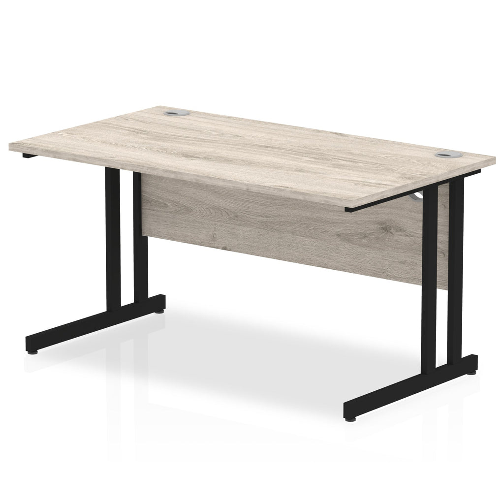Office desk with wood-effect top and metal frame on a white background
