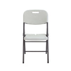 White folding chair with black frame on a white background