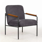 Grey armchair with black frame and brown arm pads on a white background