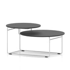 Two tier coffee table with black tops and white frame on a white background
