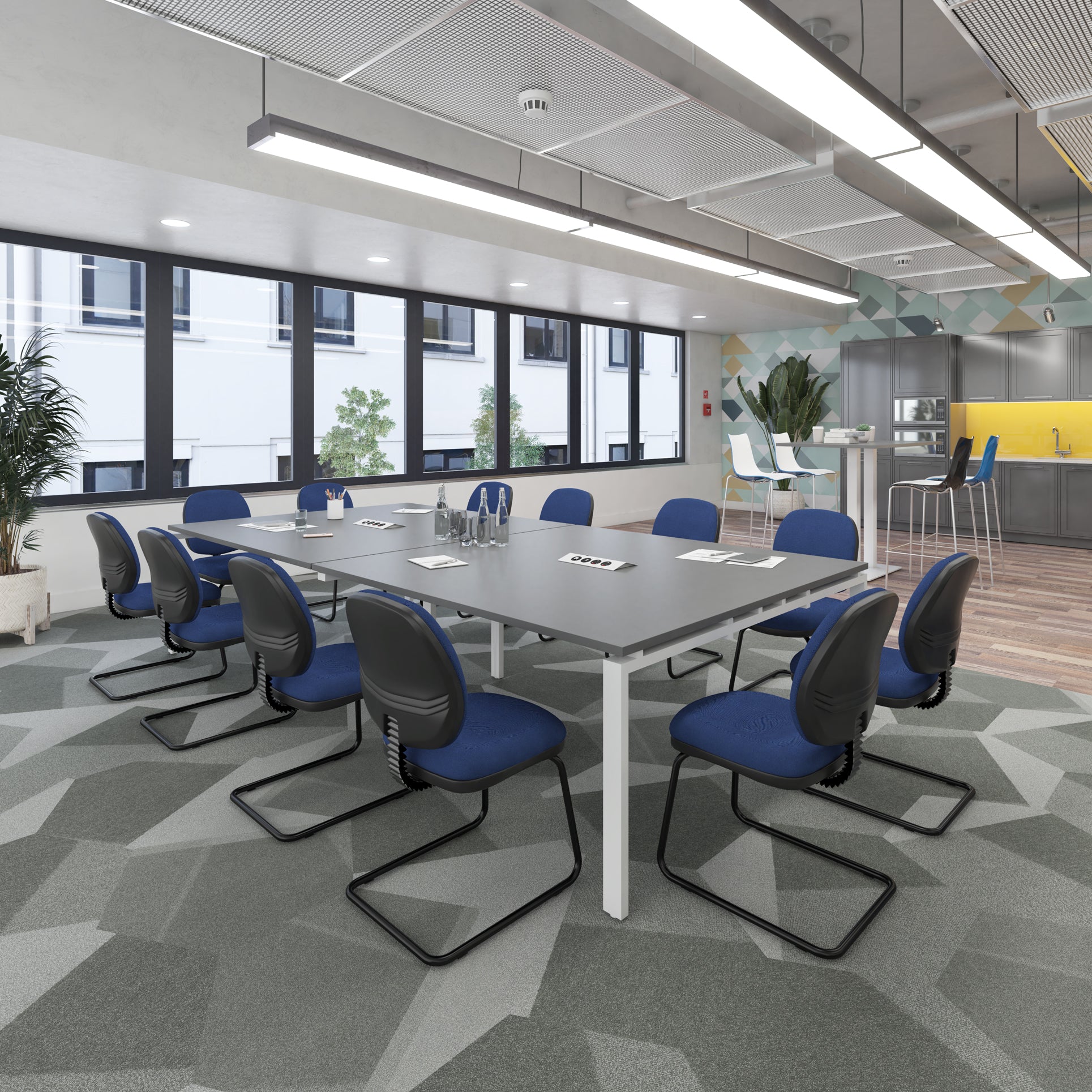 Modern conference room with a large table and blue chairs.