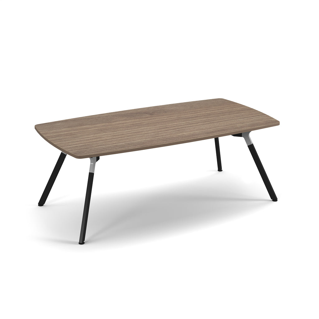A modern rectangular table with a rounded-rectangular wood-grain top and four angled black metal legs, shown on a clean white background.