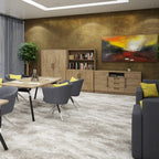 A modern office or lounge interior with a large abstract painting on a textured brown wall, wooden bookshelves and cabinets, grey chairs, a grey sofa with yellow pillows, and a light grey rug.