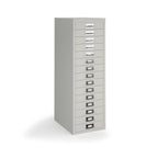 A tall, narrow light grey metal file cabinet with 15 individual drawers, each featuring a silver pull handle and a label slot, shown on a white background.
