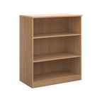 A three-tier bookcase with a wood-effect finish, shown from a three-quarter angle on a solid white background.