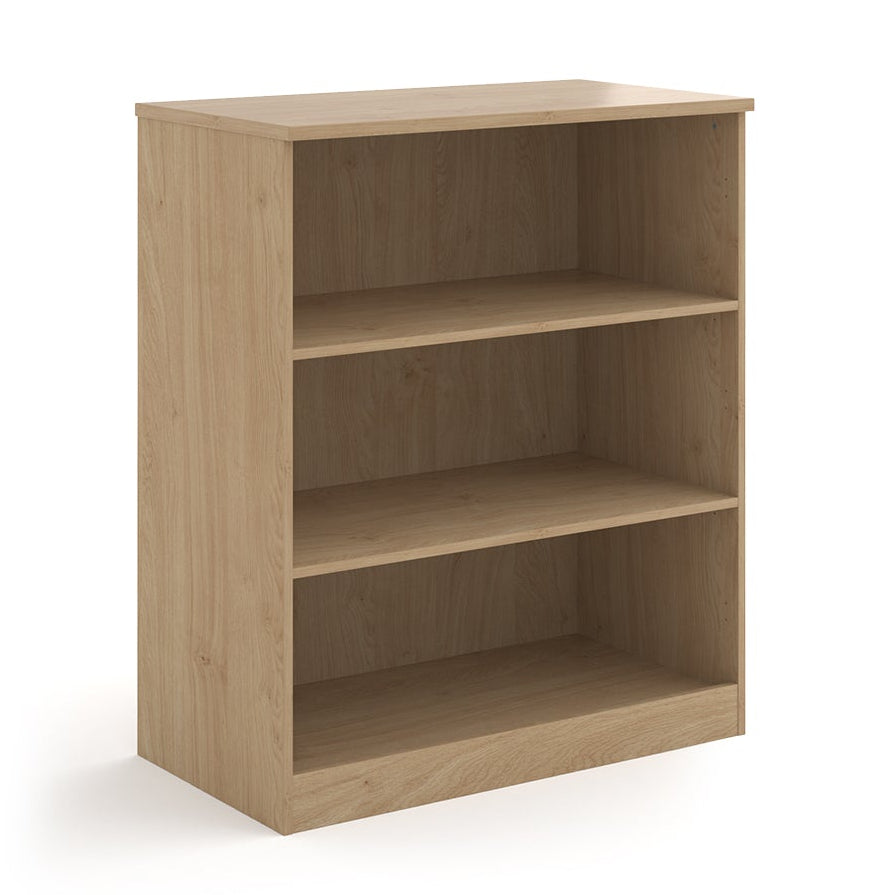 A three-tier bookcase with a wood-effect finish, shown from a three-quarter angle on a solid white background.