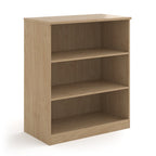A three-tier bookcase with a wood-effect finish, shown from a three-quarter angle on a solid white background.