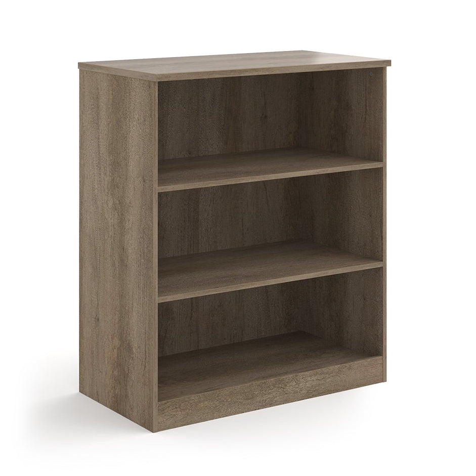 A three-tier bookcase with a wood-effect finish, shown from a three-quarter angle on a solid white background.