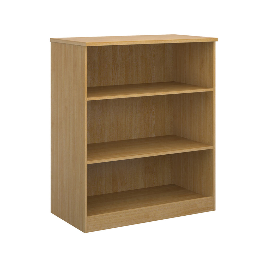 A three-tier bookcase with a wood-effect finish, shown from a three-quarter angle on a solid white background.