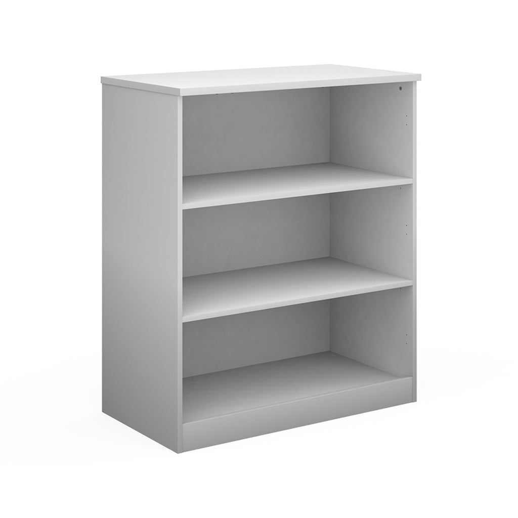 A three-tier bookcase in white, shown from a three-quarter angle on a solid white background.