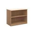 A two-tier bookcase with a wood-effect finish, shown from a three-quarter angle on a solid white background.