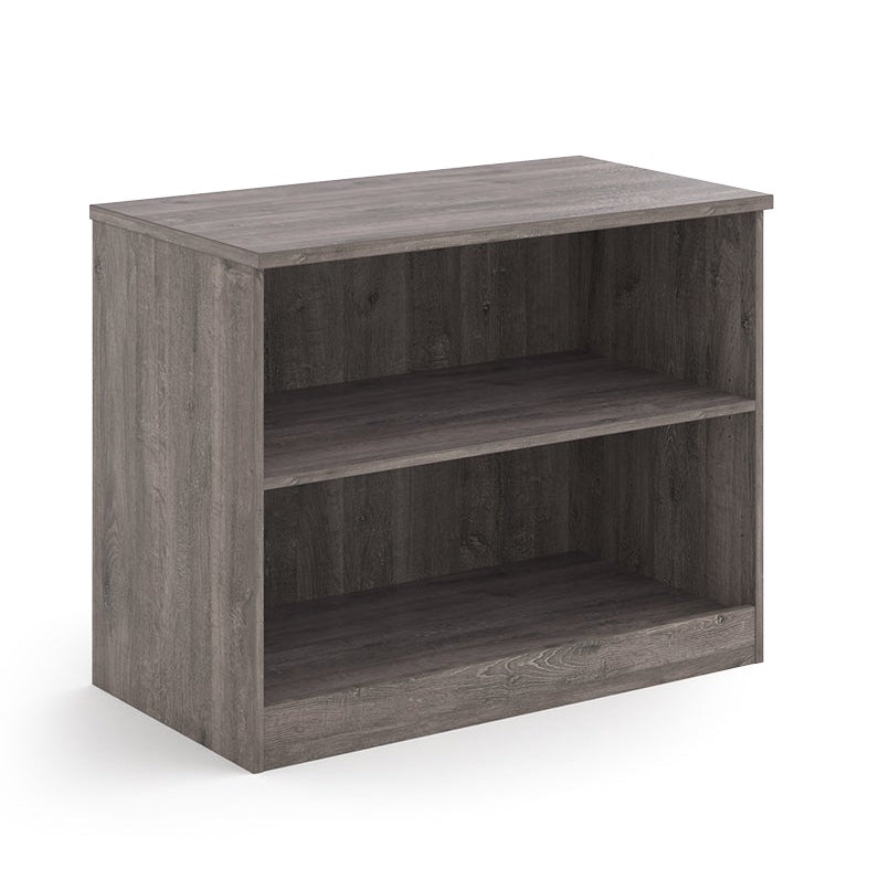 A two-tier bookcase with a grey wood-effect finish, shown from a three-quarter angle on a solid white background.