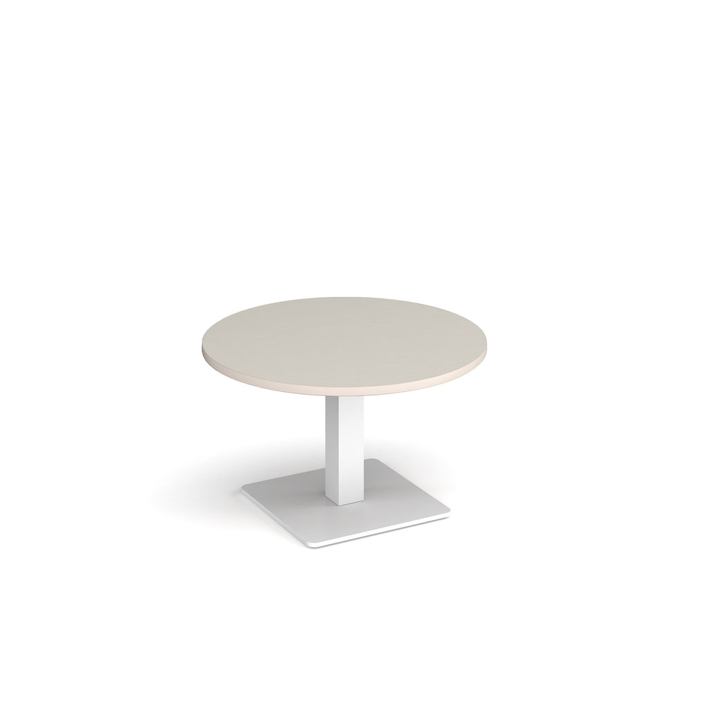 A modern round coffee table with a light grey top and a square white pedestal base, shown on a plain white background.