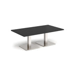 Rectangular coffee table with black top and two brushed steel metal square bases, shown on a white background