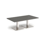 Rectangular coffee table with grey top and two brushed steel metal square bases, shown on a white background
