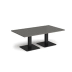 Rectangular coffee table with grey top and two black metal square bases, shown on a white background