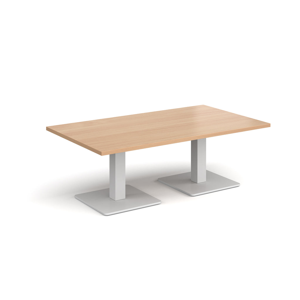 Rectangular coffee table with wood-effect top and two white metal square bases, shown on a white background