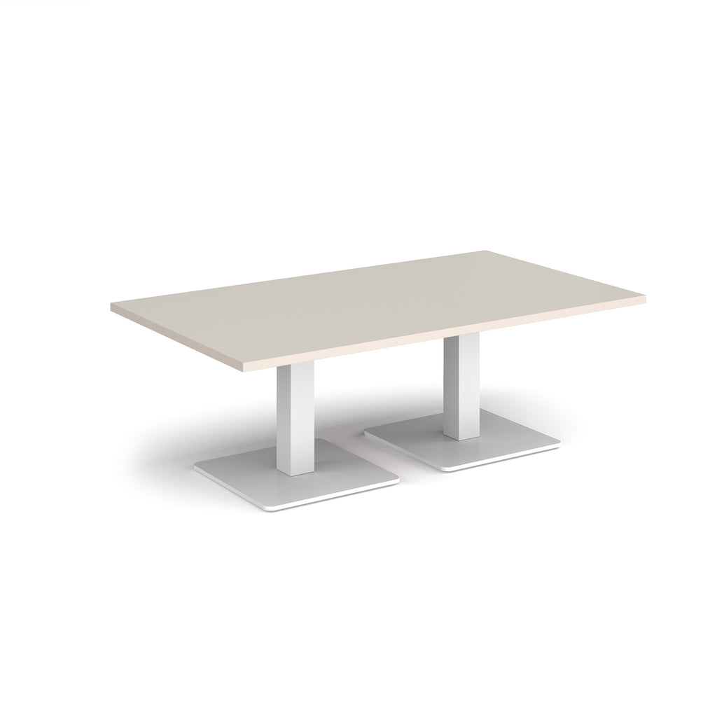 Rectangular coffee table with light grey top and two white metal square bases, shown on a white background