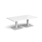 White rectangular coffee table with metal square bases, shown on a white background