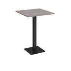 Square poseur table with grey wood-effect top and black metal base on a white background