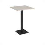 Square poseur table with light grey top and black metal base on a white background