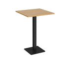 Square poseur table with wood-effect top and black metal base on a white background