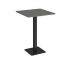 Square poseur table with grey top and black metal base on a white background