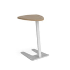 A modern side table with a light wood triangular tabletop, a white cylindrical pedestal base, and a flat silver metal U-shaped footrest, shown on a plain white background.