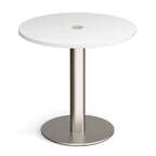 A modern round table with a white top with central white power module and a brushed stainless steel pedestal base, shown on a clean white background.