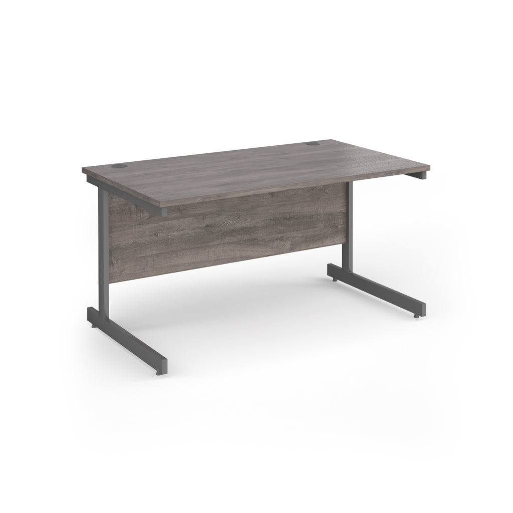 Rectangular desk with grey wood-effect top and grey metal frame on a white background