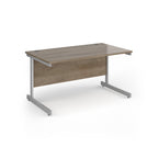 Rectangular desk with wood-effect top and silver metal frame on a white background