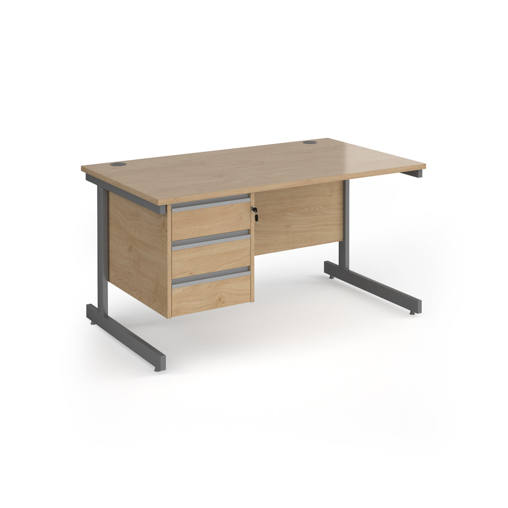 Rectangular desk with wood-effect top and matching 3-drawer pedestal, grey metal frame, shown on a white background