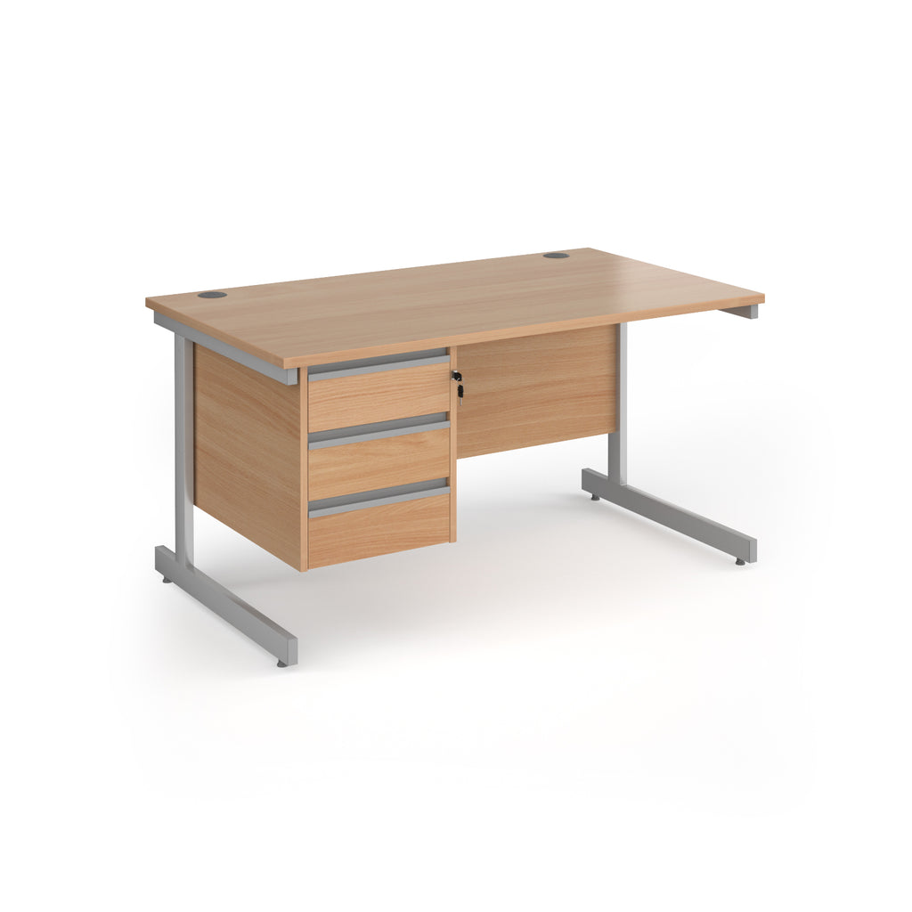 Rectangular desk with wood-effect top and matching 3-drawer pedestal, silver metal frame, shown on a white background