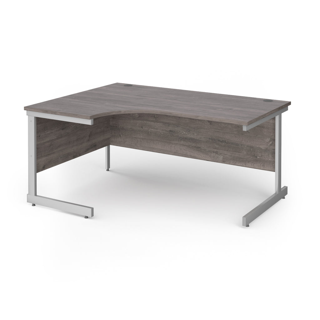 Corner desk with grey wood-effect top and silver metal frame on a white background