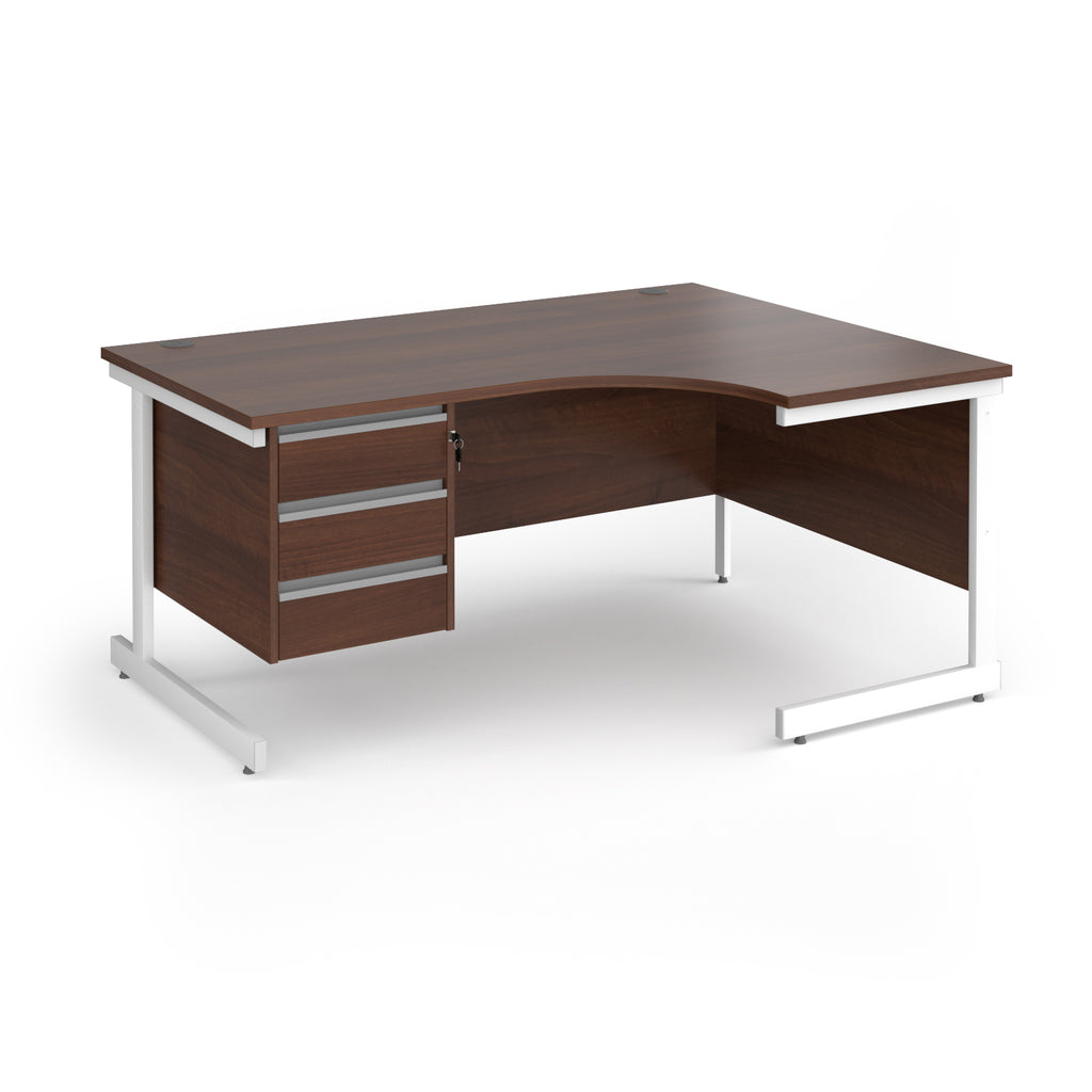 Corner office desk with a dark brown wood grain finish and a white metal frame, featuring three drawers on the left with silver handles.