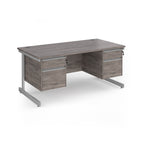 Rectangular desk with grey wood-effect top and two matching 2-drawer pedestals, silver metal frame, shown on a white background