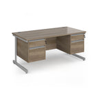Rectangular desk with wood-effect top and two matching 2-drawer pedestals, silver metal frame, shown on a white background