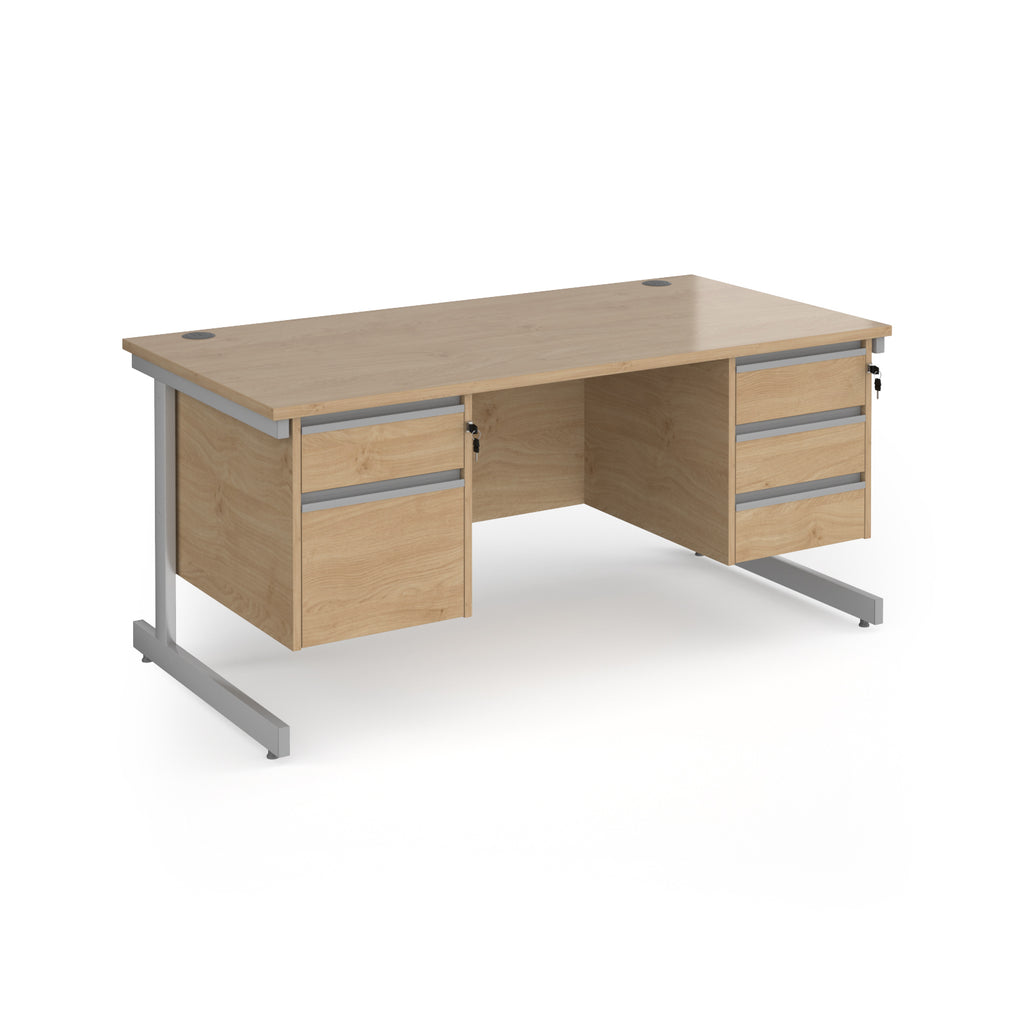 Rectangular desk with wood-effect top and two matching pedestals one 2-drawer and one 3-drawer, silver metal frame, shown on a white background