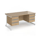 A modern office desk with a light oak wood grain finish and white metal legs, featuring three drawers on the left and three drawers on the right.
