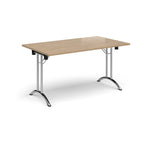 Folding table with wood-effect top and chrome legs on a white background