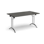 Folding table with grey top and chrome legs on a white background