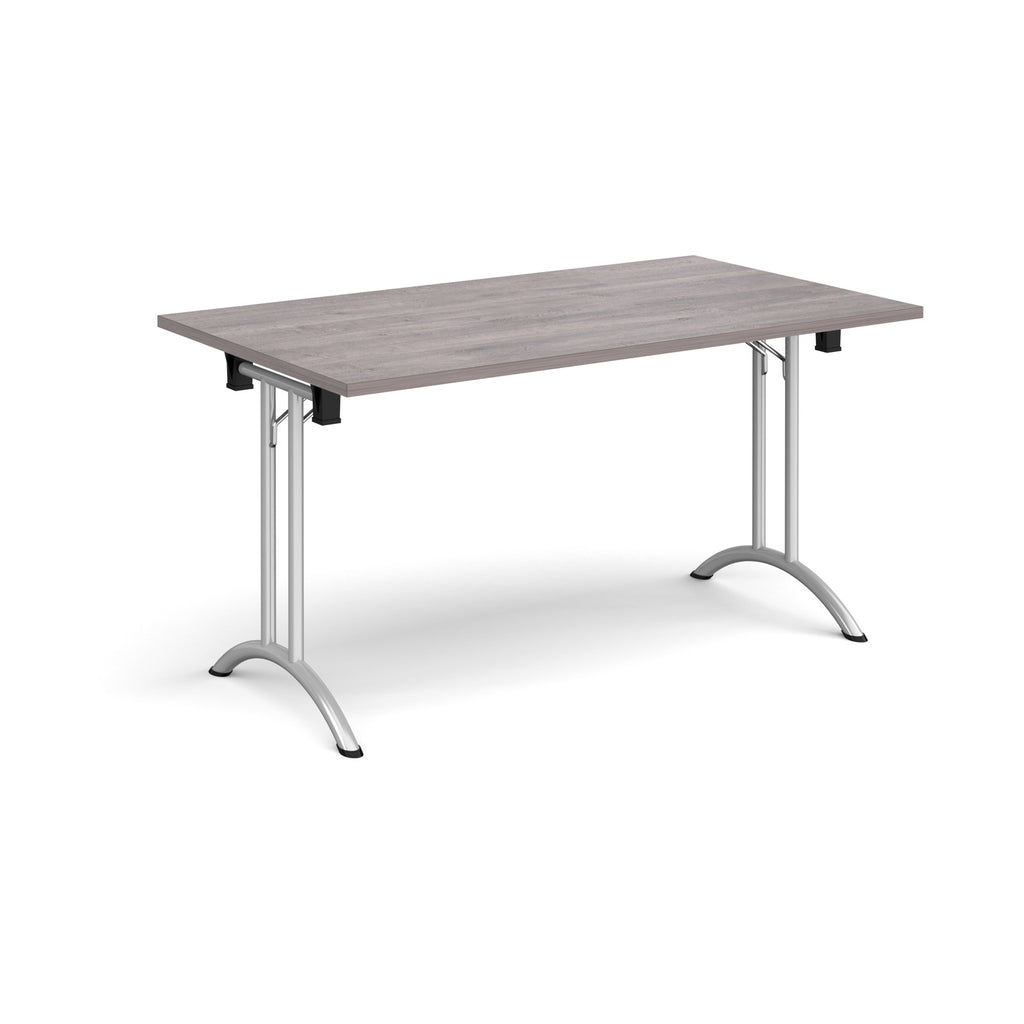 Folding table with grey wood-effect top and silver legs on a white background
