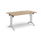 Folding table with wood-effect top and silver legs on a white background