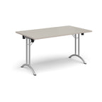 Folding table with wood-effect top and silver legs on a white background