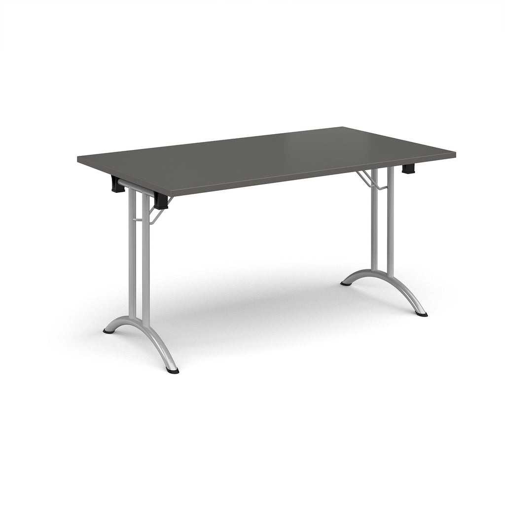 Folding table with grey top and silver legs on a white background