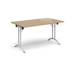 Folding table with wood-effect top and white legs on a white background